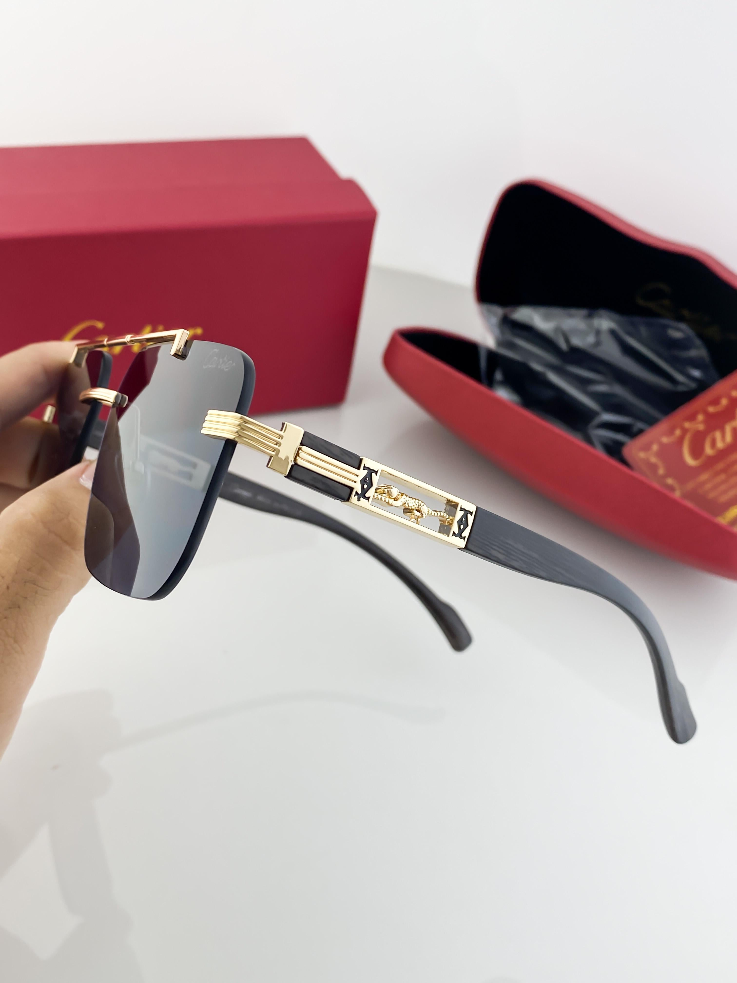 CAR_TI_ER GOLD BLACK 3120 B